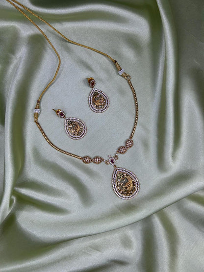 Regal Peacock Motif Gold & Stone-Studded Jewellery Set